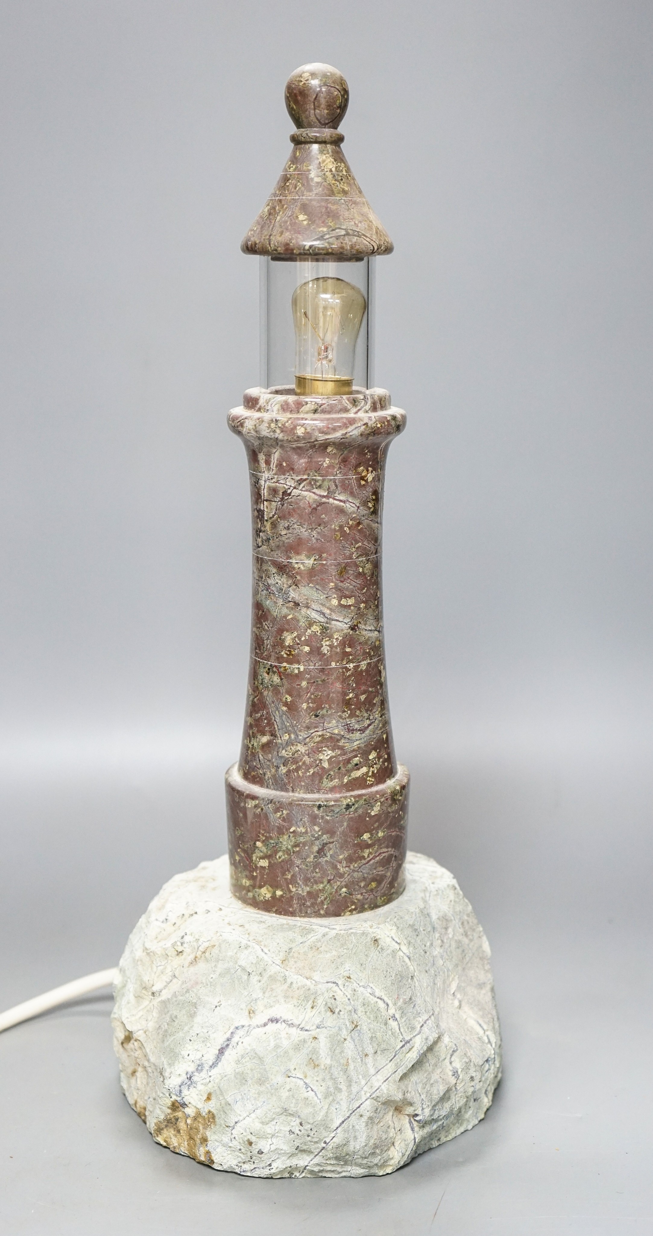 A Cornish serpentine ‘lighthouse’ table lamp 42cm